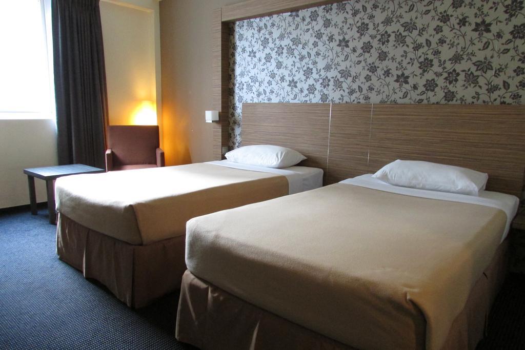 Strand Hotel Singapura Quarto foto