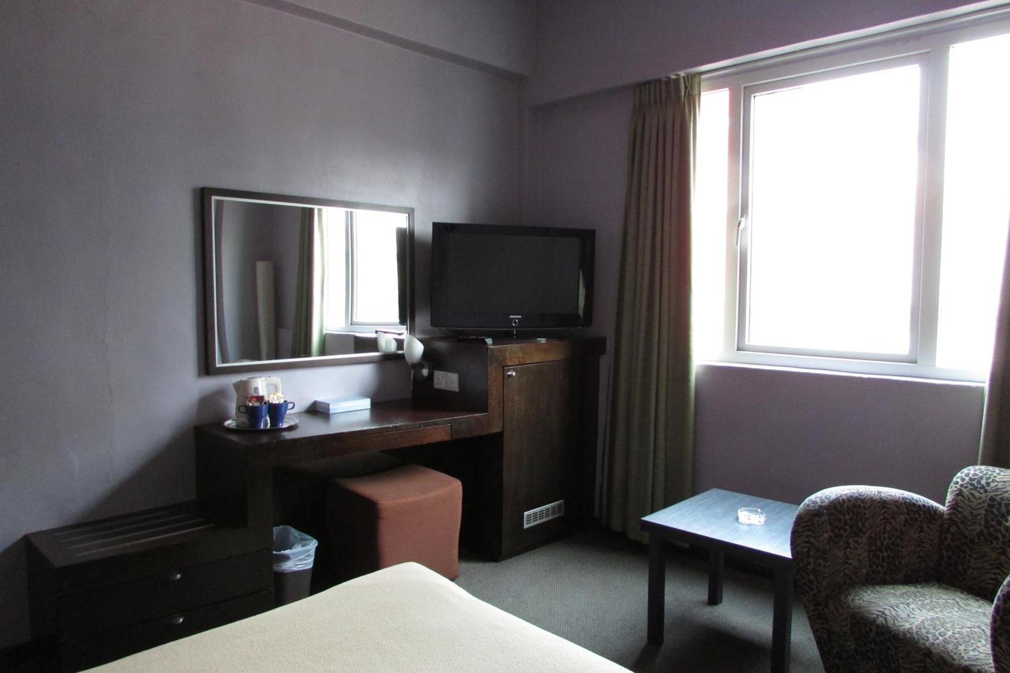 Strand Hotel Singapura Quarto foto