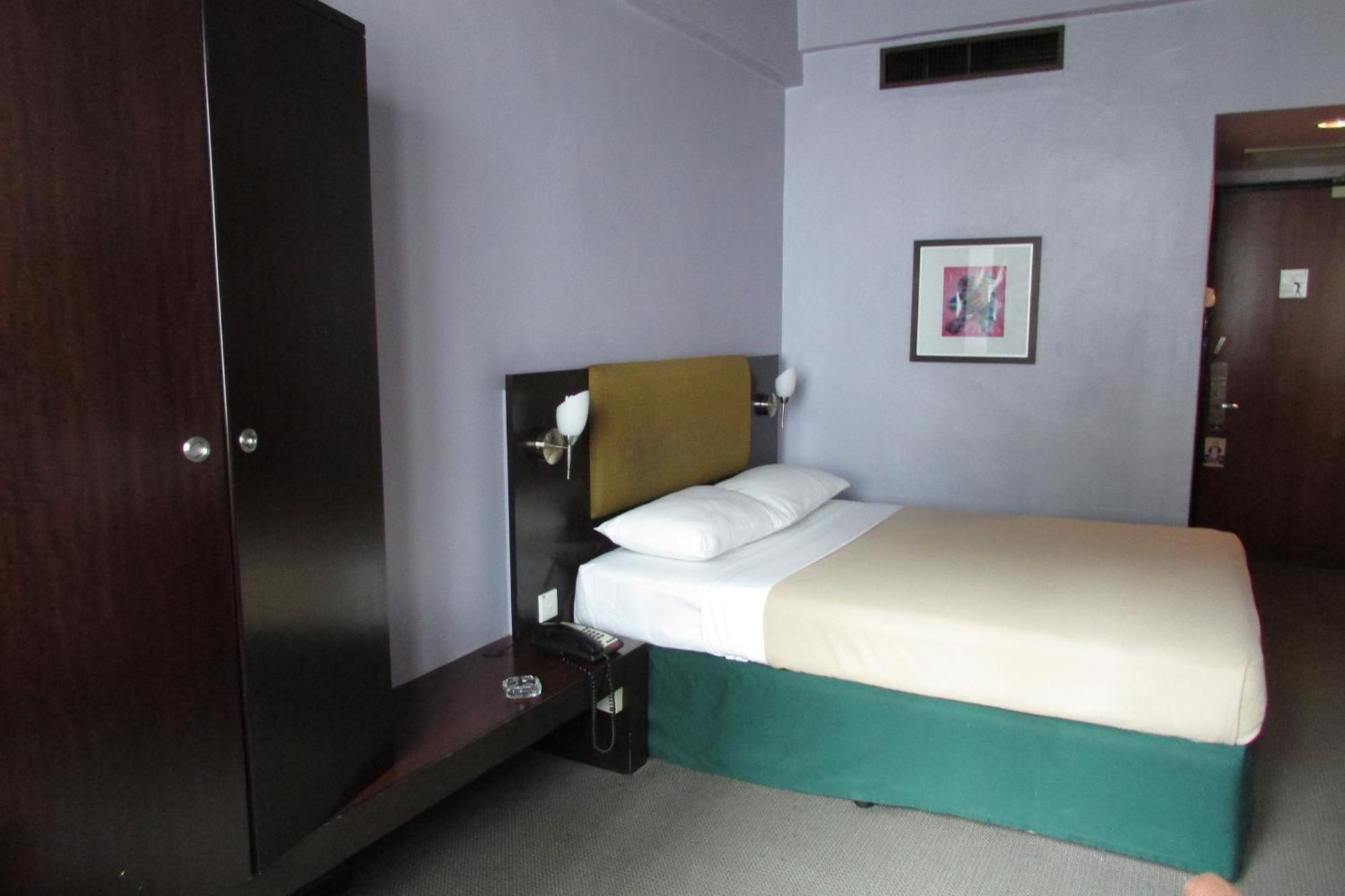 Strand Hotel Singapura Quarto foto