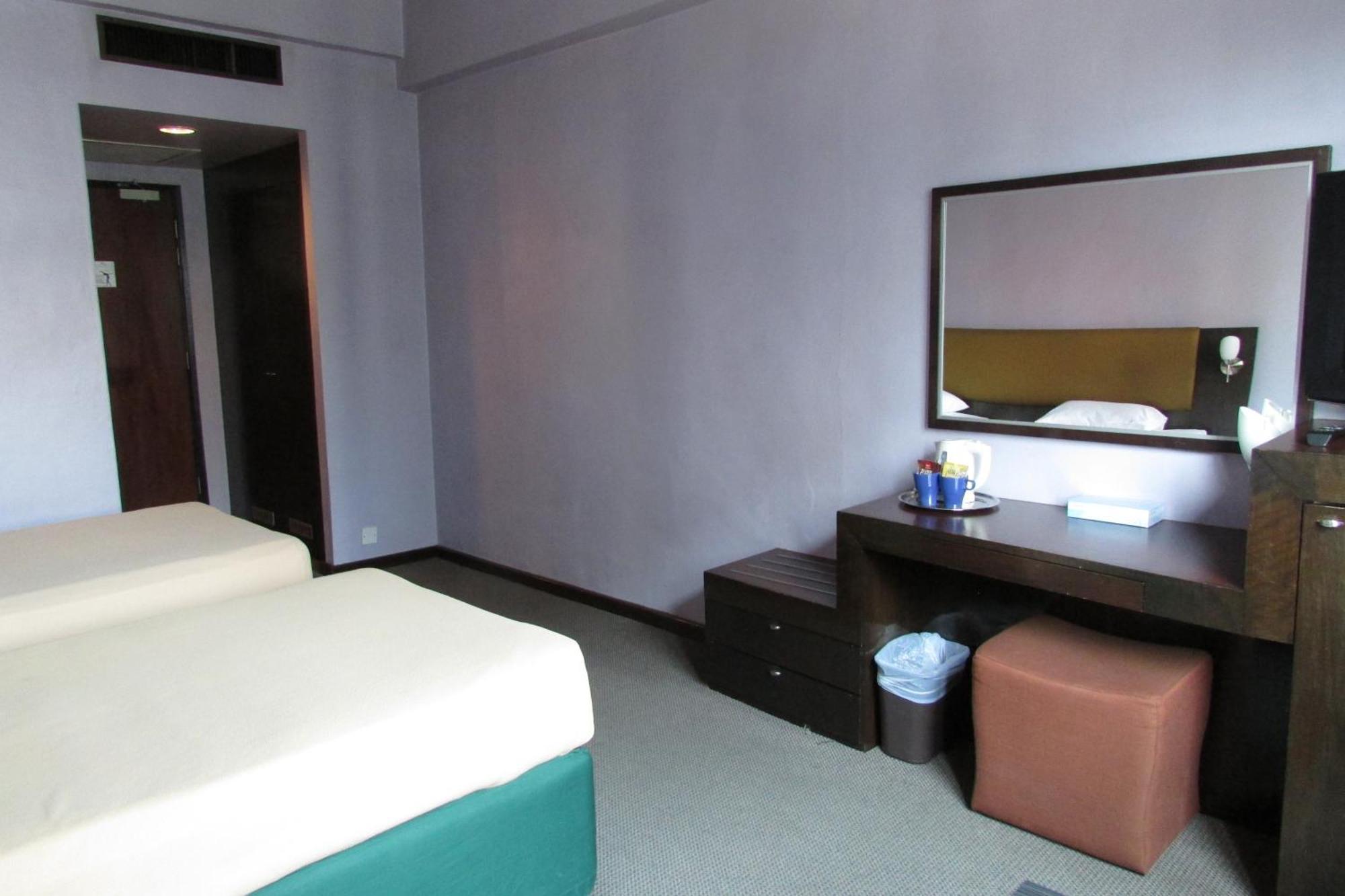 Strand Hotel Singapura Quarto foto
