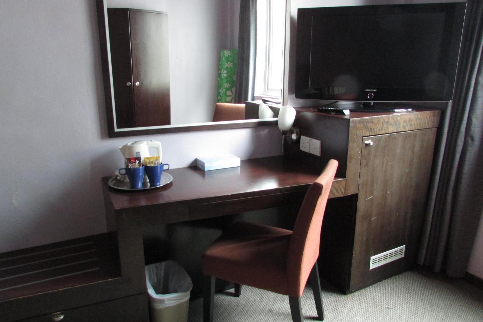 Strand Hotel Singapura Quarto foto